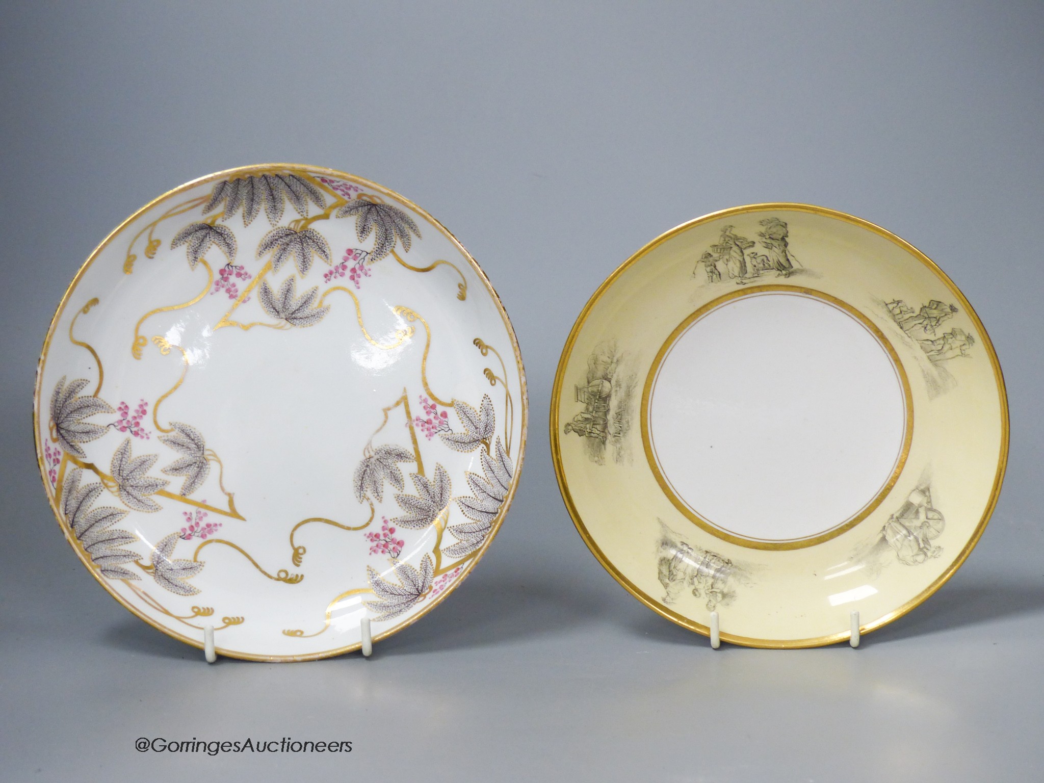 A Barr Worcester yellow ground saucer dish printed with 'Country Folk' and a New Hall Saucer dish painted with pattern No 85, largest 19cm diameter